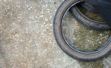 old motorcycle tire on road concrete. top view