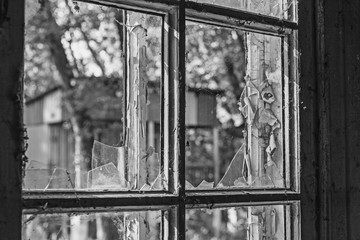 completely broken glass in old wooden windows