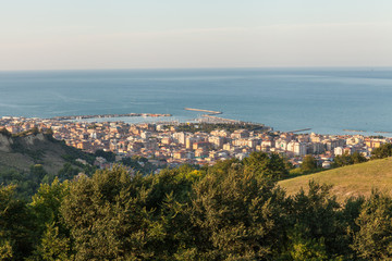 Panoramic view of San Benedetto del Tronto city in the sunset light. Holiday city situated on the Adriatic sea coast, Italy