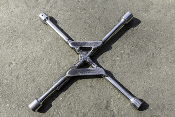 Obraz premium Wheel wrench on white