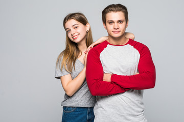 Portrait of two cute teen couples isolated on white background