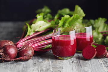 Detox juice with freshly picked bunch of beetroot