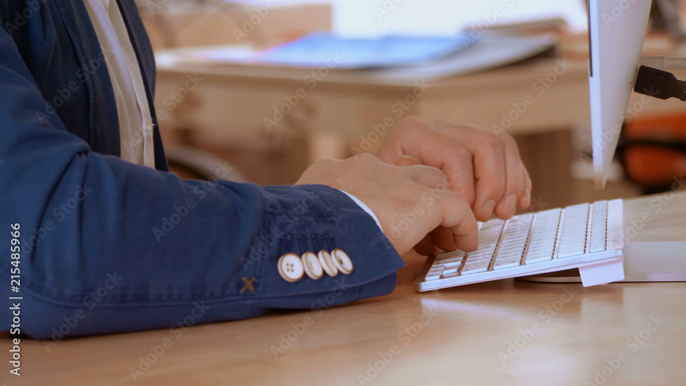 Poster manager hands entering data