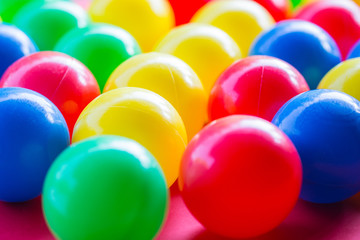 close-up of various colored balls with blurred background