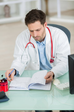 doctor reviewing his agenda