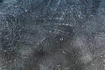 metallic scratched gray background with rivet elements