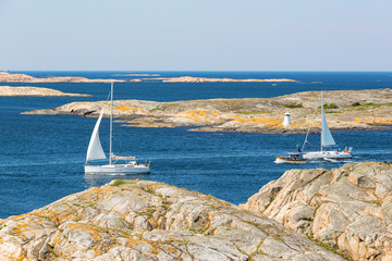 Sailing boats in rocky sea archipelago in the Swedish west coast