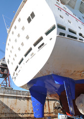 Ship repair. Under the ship. Big ship under repairing on dry dock
