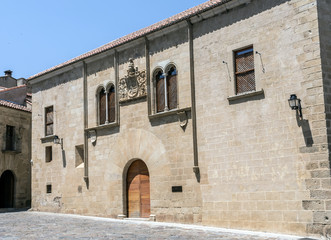 Fototapeta na wymiar Palacio de Mayoralgo, located in Plaza de Santa Maria is from the late 15th and early 16th century, in the central part has a great Renaissance coat of Mayoralgo, Caceres, Spain