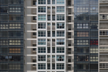 Fototapeta na wymiar Condo and apartment modern design style skyscraper building. multistorey residence facility.