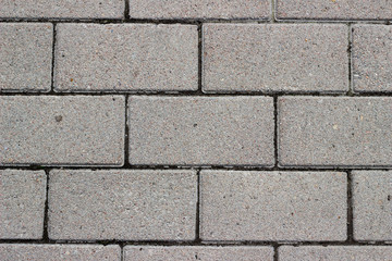 Obraz premium Concrete grey paving stones background 