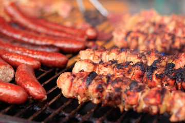 fried sausage and shashlik on the grill.