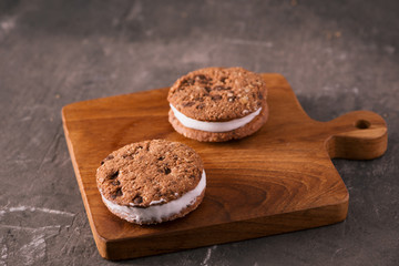 Cookie Ice Cream Sandwich Isolated on rustic wooden table