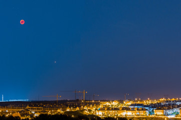 Red Moon and Mars over the city © Spike @ Neural Act.