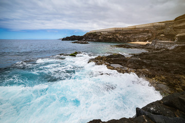 Tenerife, Canary islands, Spain - view of the beautiful Atlantic ocean coast with rocks and stones