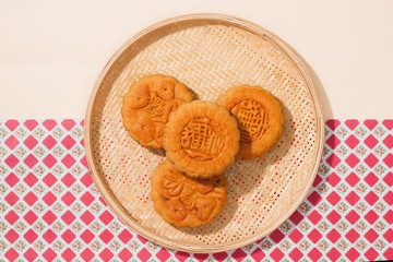 Delicious homemade mooncake of Vietnam cuisine culture. Text on cake mean happiness.
