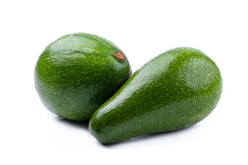 Green ripe avocado isolated on the white background