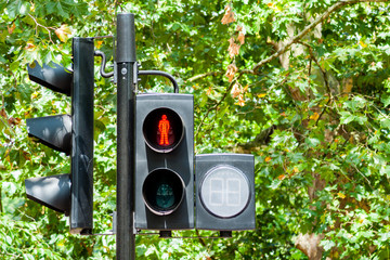 Traffic light with red sign to stop