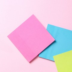 Red, yellow and blue stickers. Flat lay. Business concept. Pastel shades. Top view