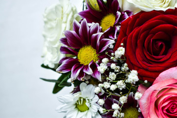  Flowers in a bouquet, festive background of a rose