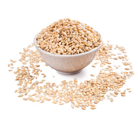 Wheat grains in bowl on white background
