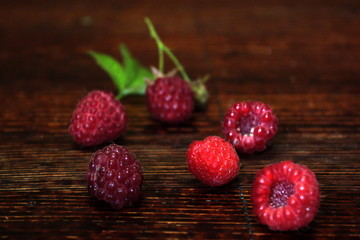 Ripe raspberry on the table.