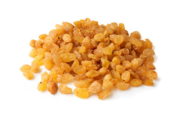 Heap of yellow raisins isolated on white background