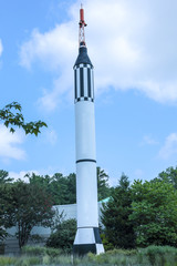Obraz premium Space rocket isolated on blue background