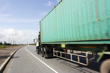  Transportation concept,import,export logistic industrial,Truck on highway road with big container