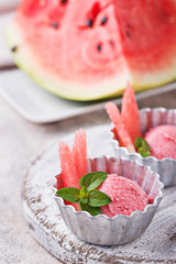 Watermelon ice cream in metal bowls 