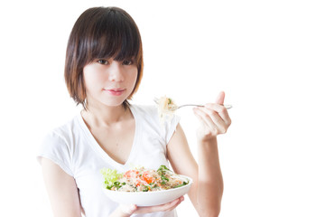 woman eating salad