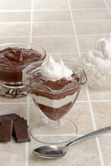 closeup chocolate parfait with spoon
