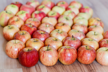beautiful apples lie on a wooden background