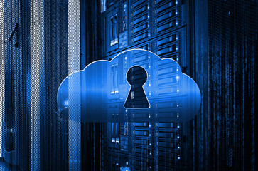 Cloud technology concept: pixelated Cloud With Keyhole icon over modern mainframe disk storage in data center