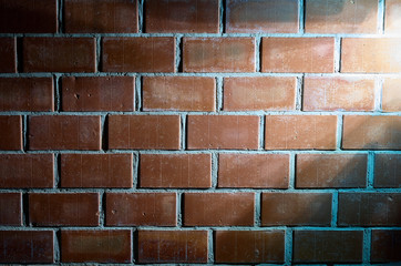 rays of light on a brick wall