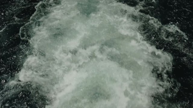 View from the yacht to the waves of the azure sea
