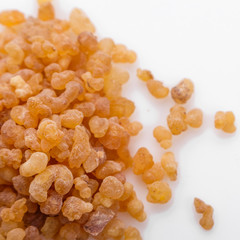 fragrant frankincense on a white acrylic background