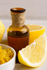 Lemon essential oil on a white background