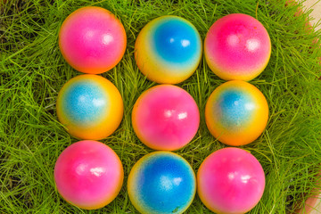 colorful painted easter eggs on grass