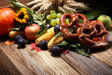Autumn nature concept. Fall fruit and vegetables on wood. Thanksgiving dinner.