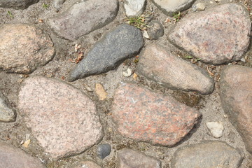 rötliches und graues Kopfsteinpflaster