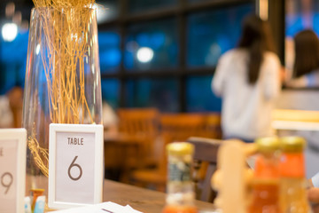 number table six text in coffee shop