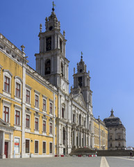 Fototapeta na wymiar National palace of Mafra. Neighborhood of Lisbon, Portugal. Franciscan monastery. Baroque architecture style. Concept of travel and tourism.