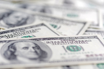US dollars, banknotes of hundred dollar bills, closeup fragment