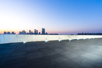empty square with city skyline