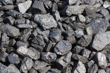 Bituminous coal non renewable energy source formed over millions of years from fossilised plant matter and used extensively in industry and for heating homes