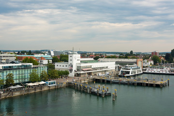 Fototapeta na wymiar View of them Ship and ferry jetty in the harbour of Friedrichshafen at Lake Constance from the viewing tower