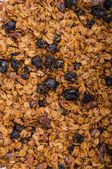 Granola baked in oven with nuts