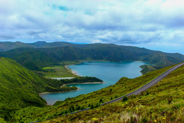 Summer morning over mountains and natural lake