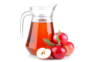 beautiful mature fresh red apple with green leaves and apple juice in a jar on a white isolated background
